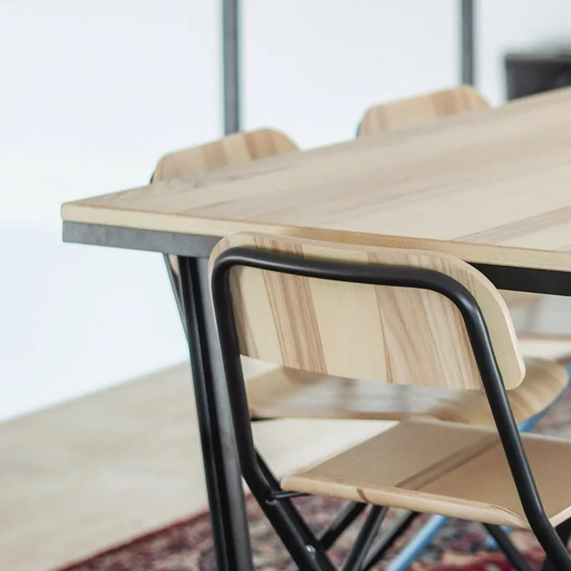 Detail of a custom wood table and chair